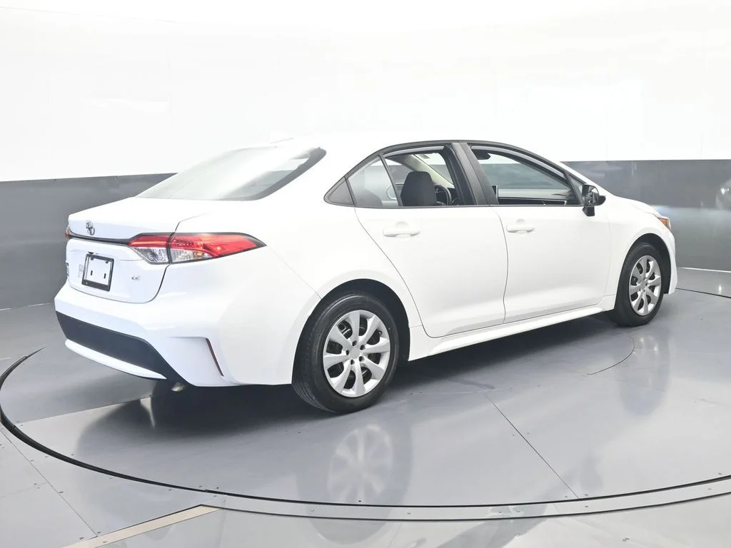 Used 2021 Super White Toyota LE image 5
