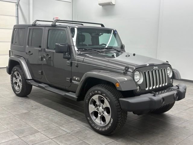 Used 2016 Gray Jeep Unlimited Sahara image 1