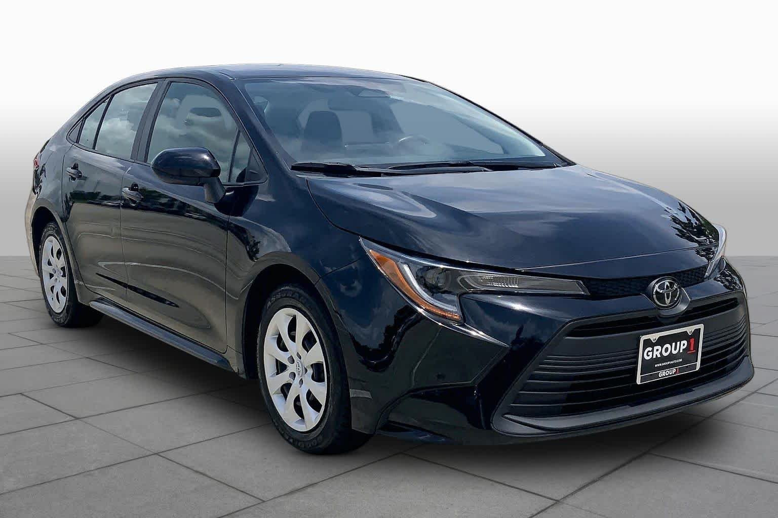 Used 2024 Midnight Black Metallic Toyota LE image 3