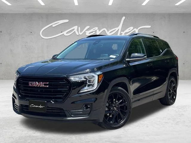 Used 2024 Ebony Twilight Metallic GMC SLT image 1