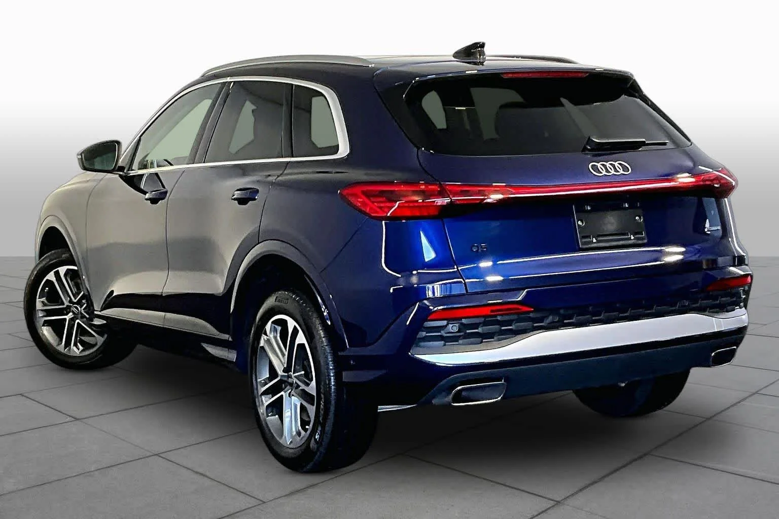 Certified Used 2025 Navarra Blue Metallic Audi Premium Plus image 12