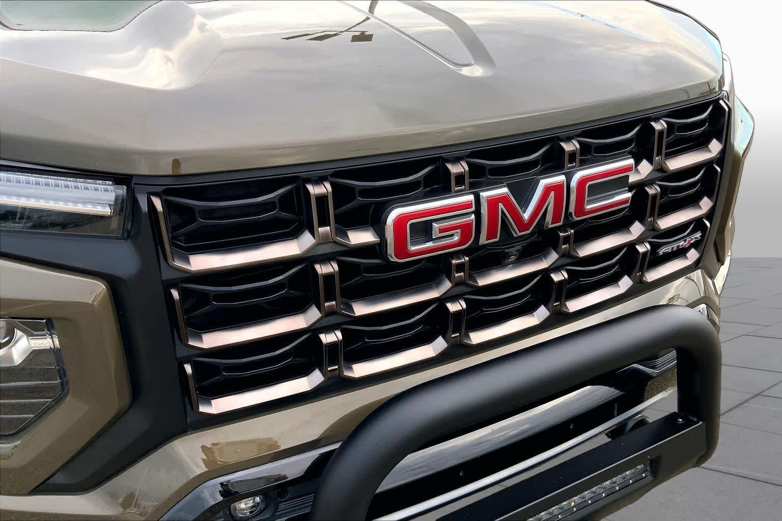 Used 2024 Deep Bronze Metallic GMC 4WD AT4X image 30