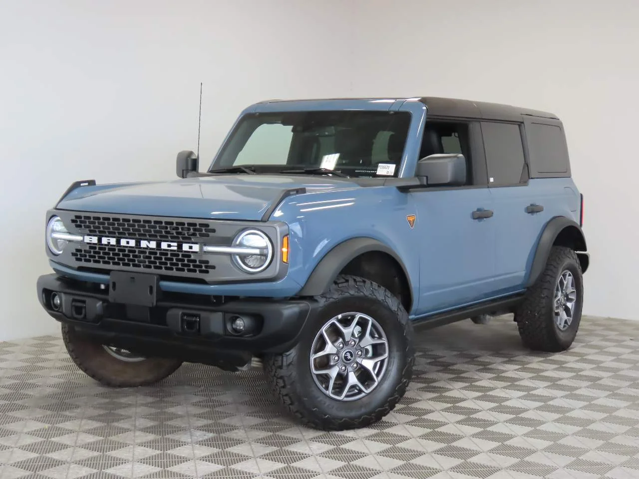 Used 2025 Azure Gray Metallic Tri-Coat Ford Badlands image 1