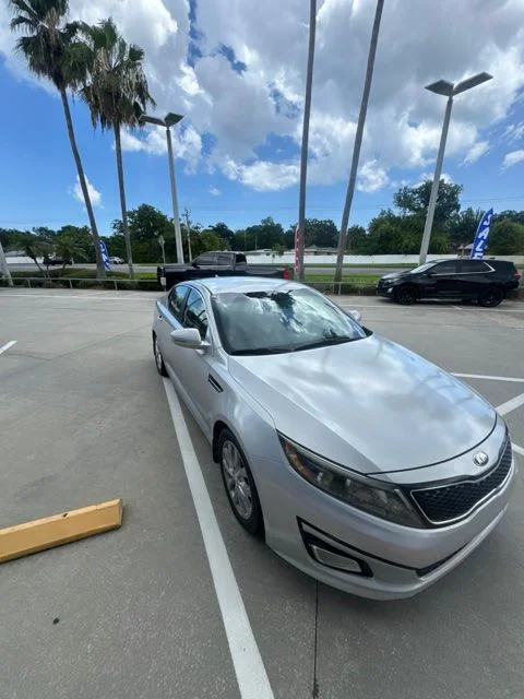 Used 2014 Kia Optima EX with VIN 5XXGN4A70EG306690 for sale in Daytona Beach, FL