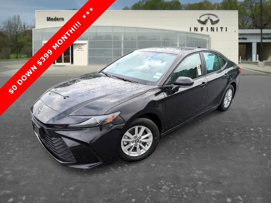 Used 2025 Midnight Black Metallic Toyota LE image 1