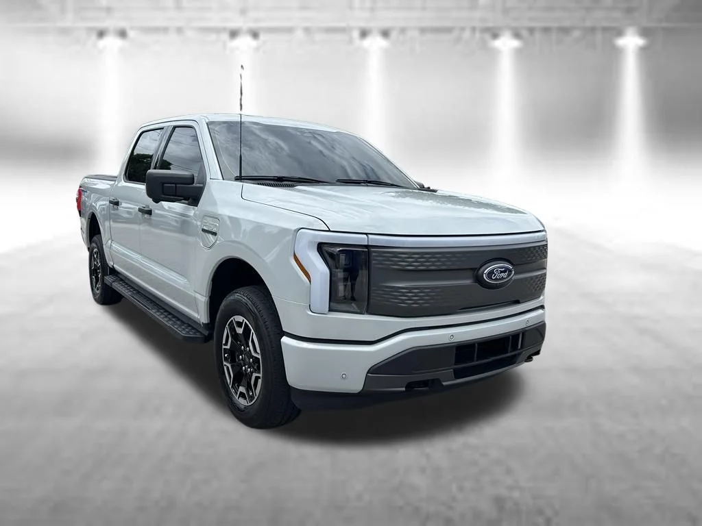 Used 2023 Ford F-150 Lightning XLT with VIN 1FTVW1EL8PWG42115 for sale in Lake Worth Beach, FL