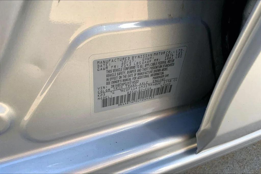 Used 2018 Brilliant Silver Metallic Nissan S image 31