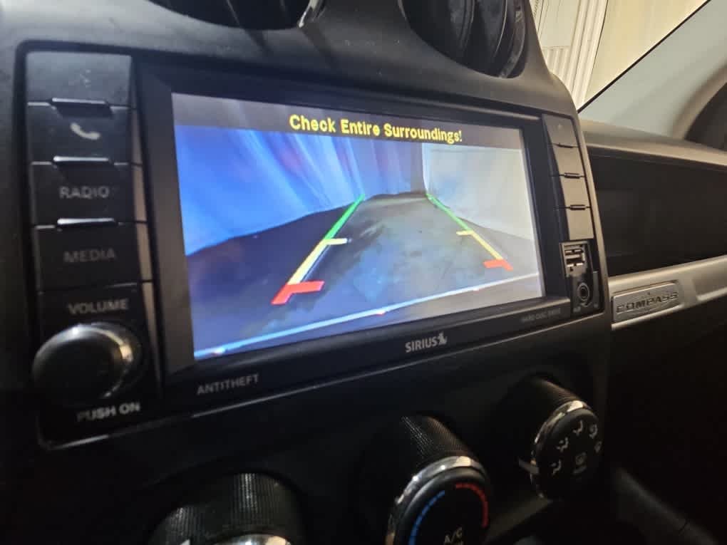 Used 2015 Black Clearcoat Jeep High Altitude Edition image 9