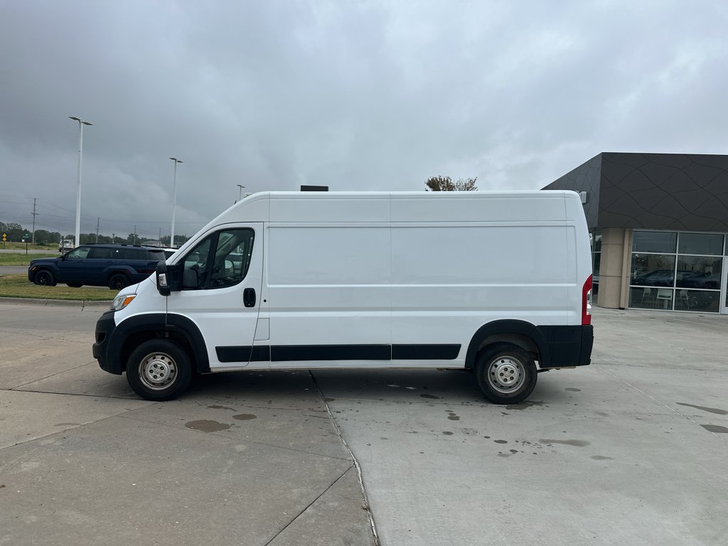 Used 2023 Bright White Clearcoat Ram High Roof 159WB image 9