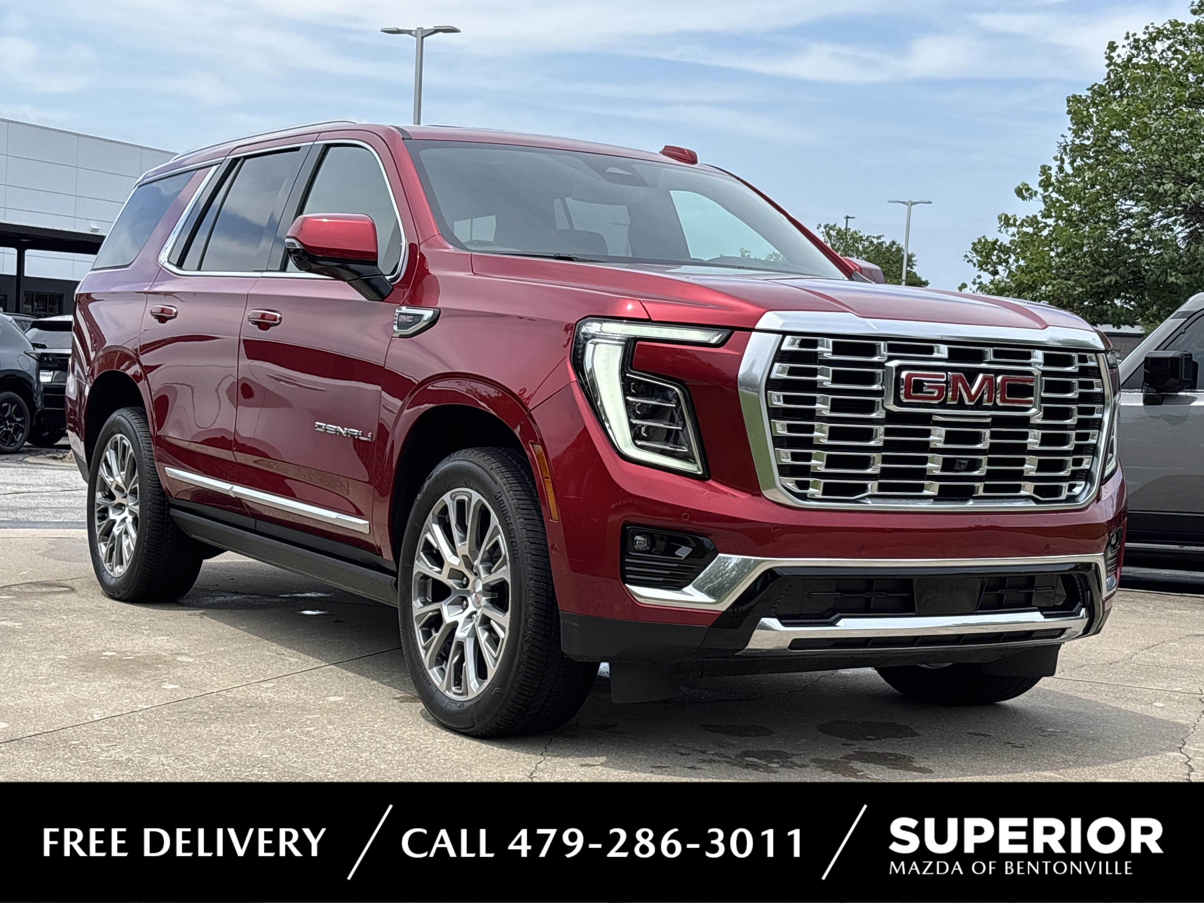 Used 2025 Volcanic Red Tintcoat GMC Denali 4WD image 1