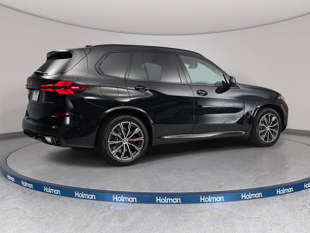New 2026 Black Sapphire Metallic BMW xDrive50e image 5
