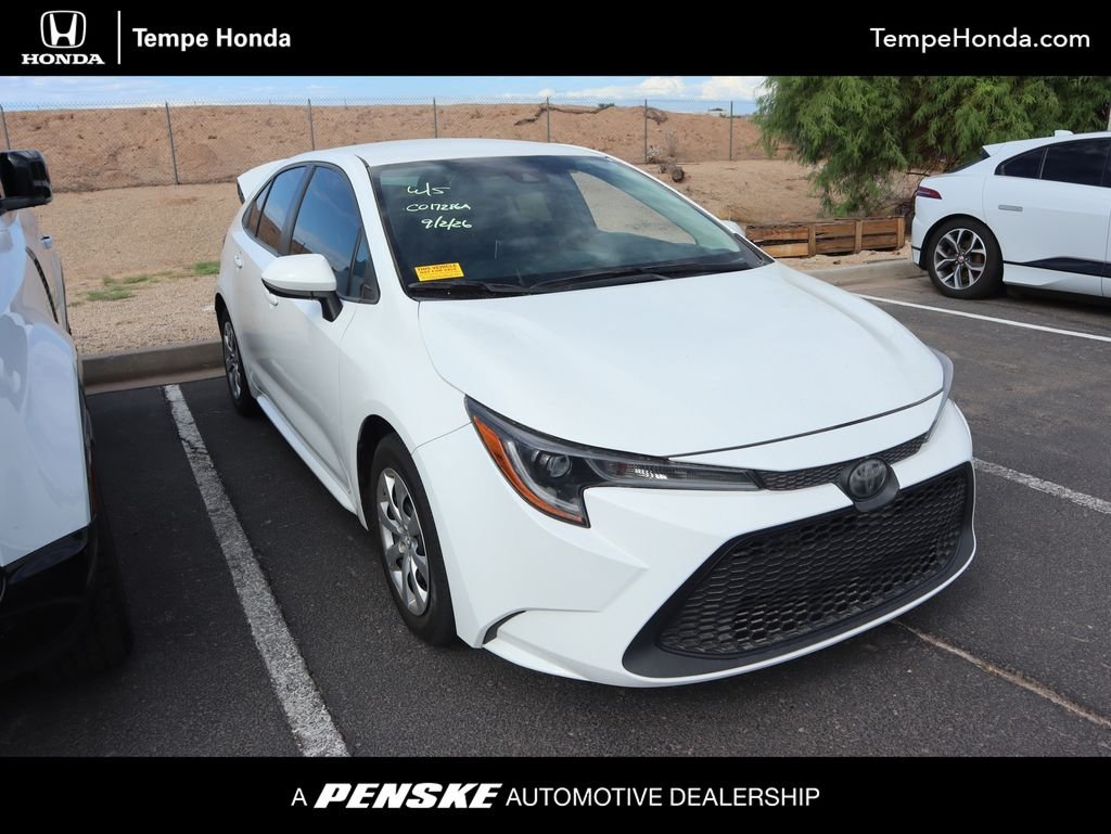 Used 2020 Super White Toyota LE image 1