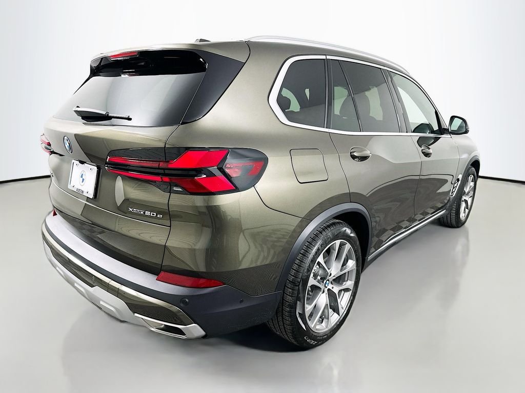 Used 2026 Manhattan Green Metallic BMW xDrive50e image 5