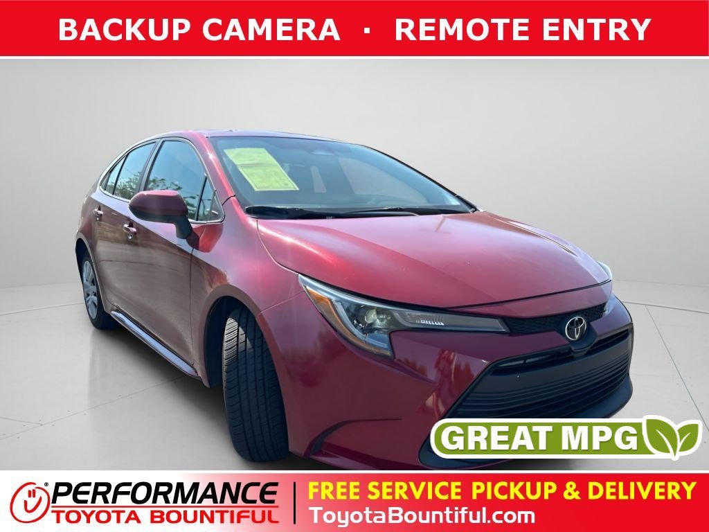 Used 2024 Pearl Toyota LE image 1