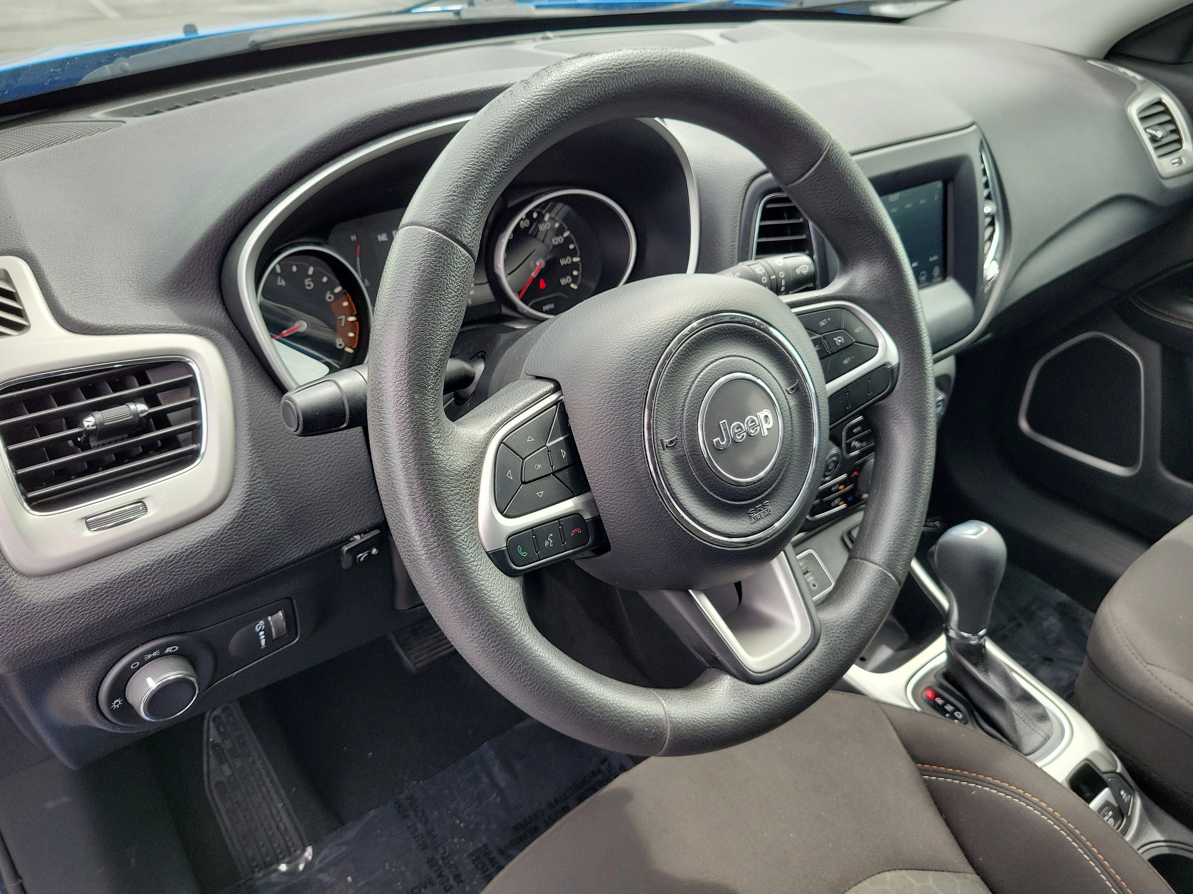 Used 2021 Laser Blue Pearlcoat Jeep Sport image 23