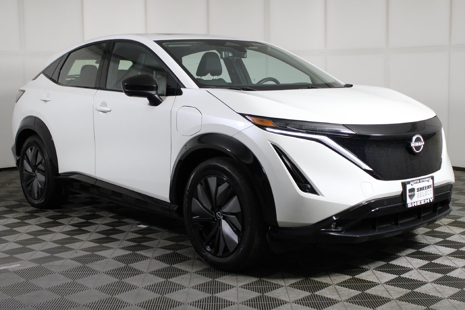 Used 2024 White Nissan EVOLVE+ e-4ORCE image 1