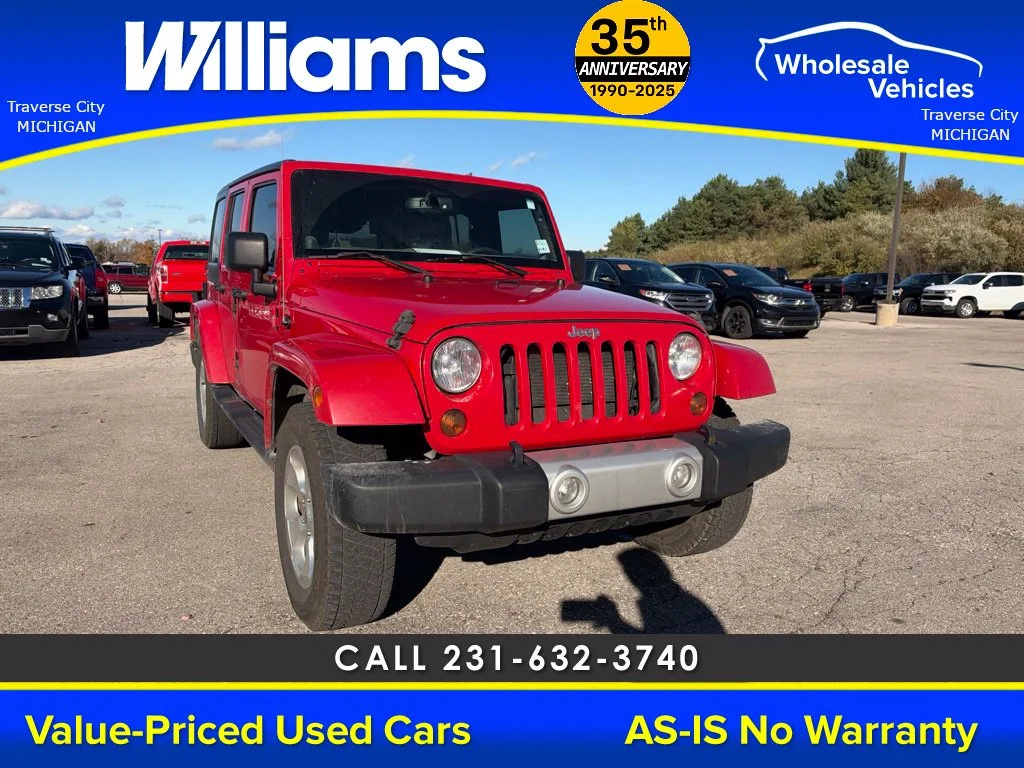 Used 2013 Flame Red Jeep Unlimited Sahara image 22