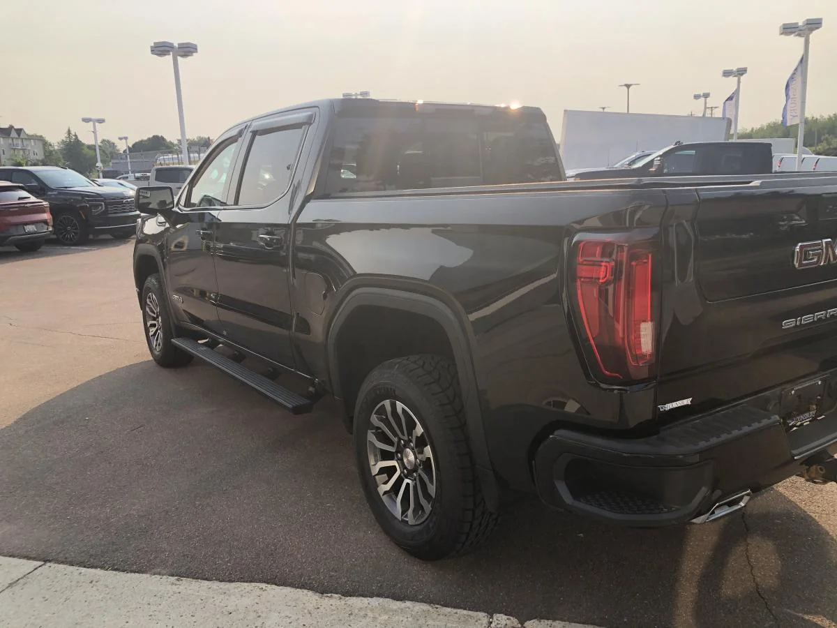 Used 2022 Black GMC 4WD Crew Cab 147" AT4 image 4