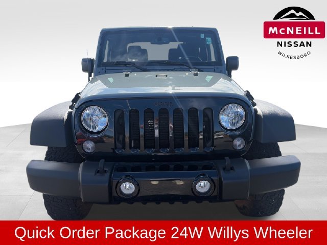 Used 2015 Jeep Wrangler Sport with VIN 1C4AJWAGXFL667701 for sale in Wilkesboro, NC