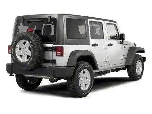 Used 2010 Silver Jeep Unlimited Sahara image 2