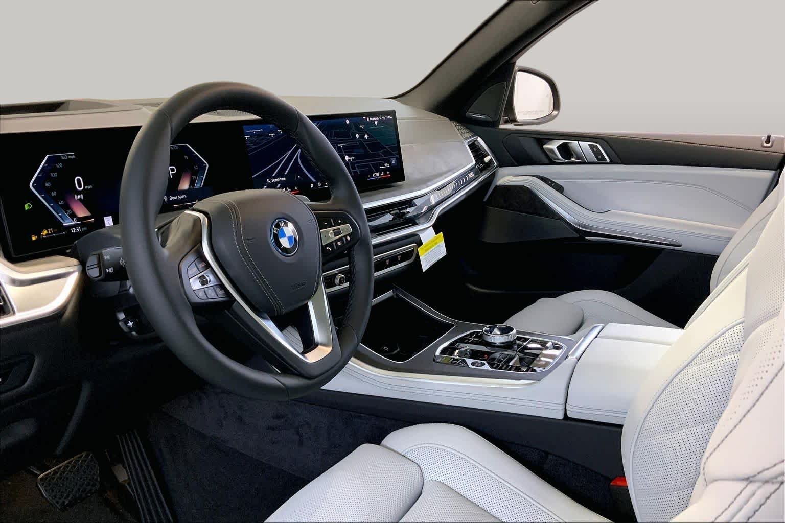 New 2026 Black Sapphire Metallic BMW xDrive50e image 8