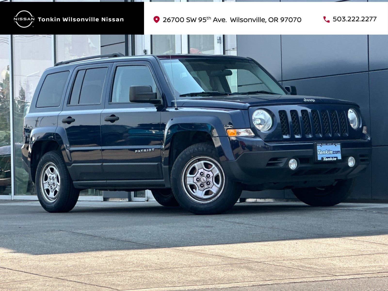 Used 2015 True Blue Pearlcoat Jeep Sport image 1