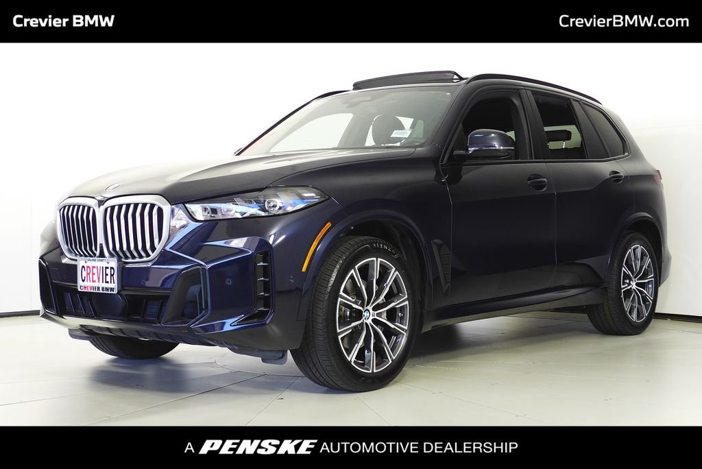 Used 2024 Carbon Black Metallic BMW sDrive40i image 1