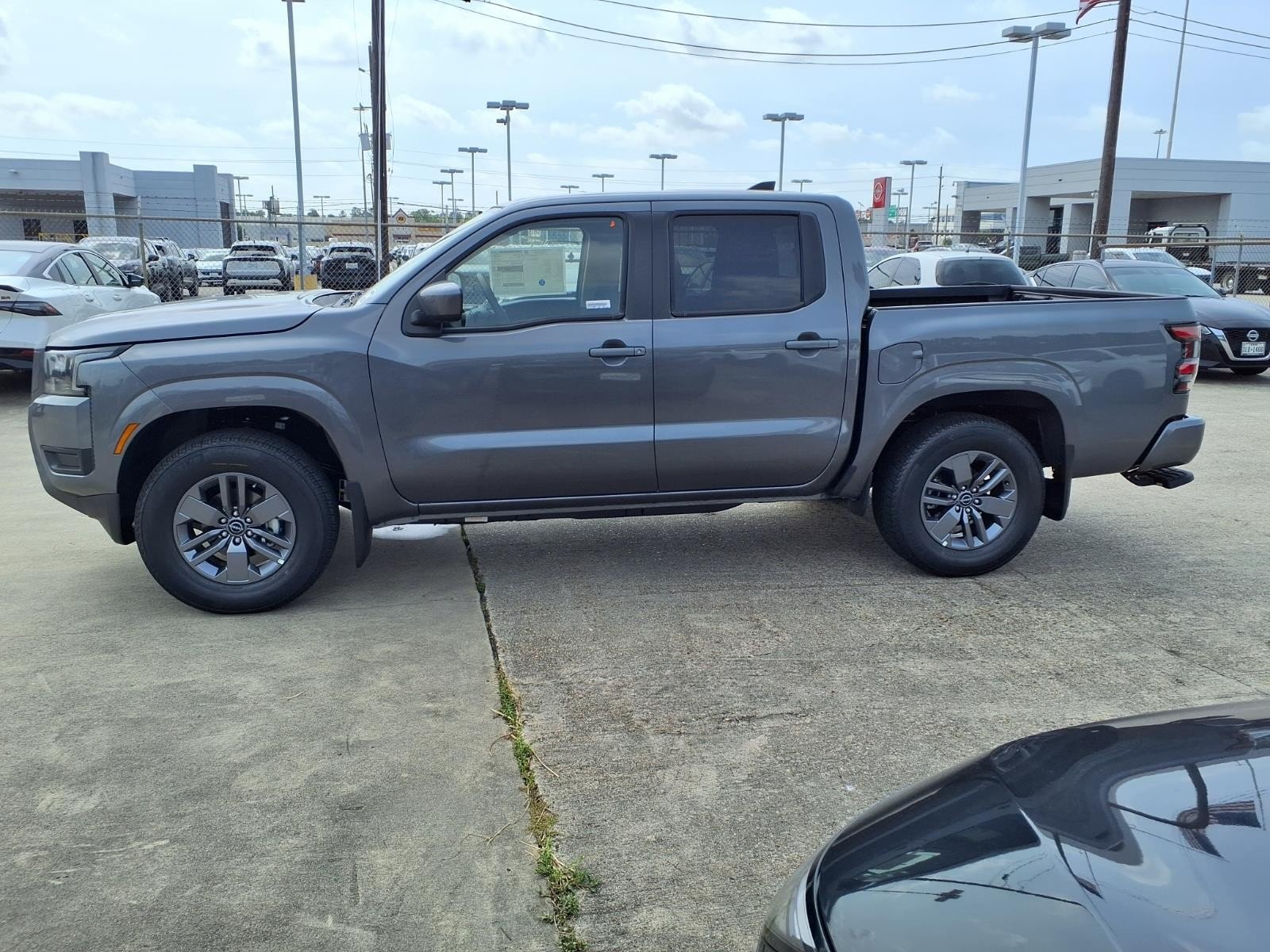New 2026 Gun Metallic Nissan Crew Cab SV image 8