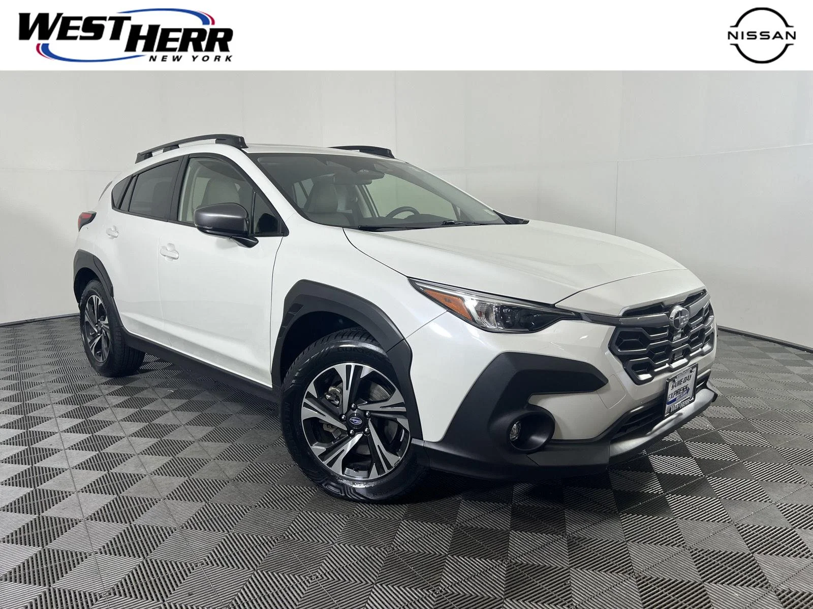 Used 2024 Crystal White Pearl Subaru Premium image 1