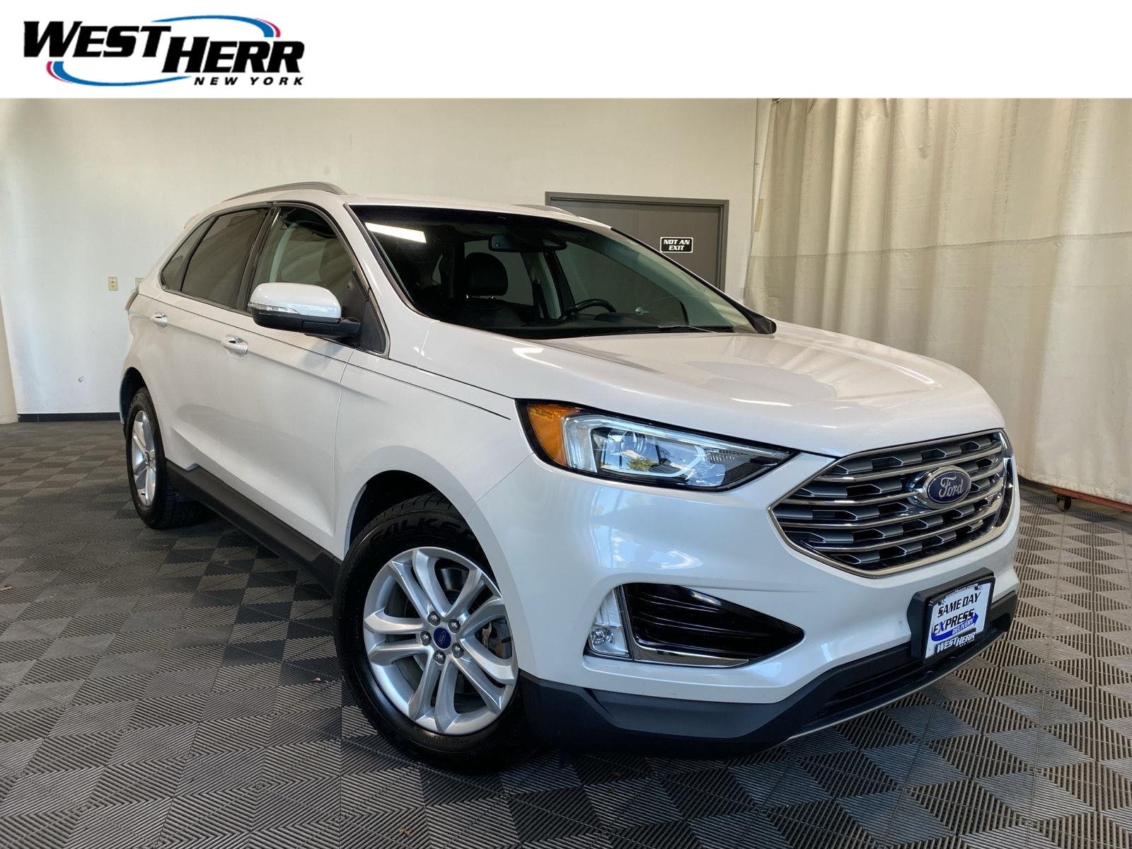 Used 2019 White Platinum Metallic Tri-Coat Ford SEL image 1