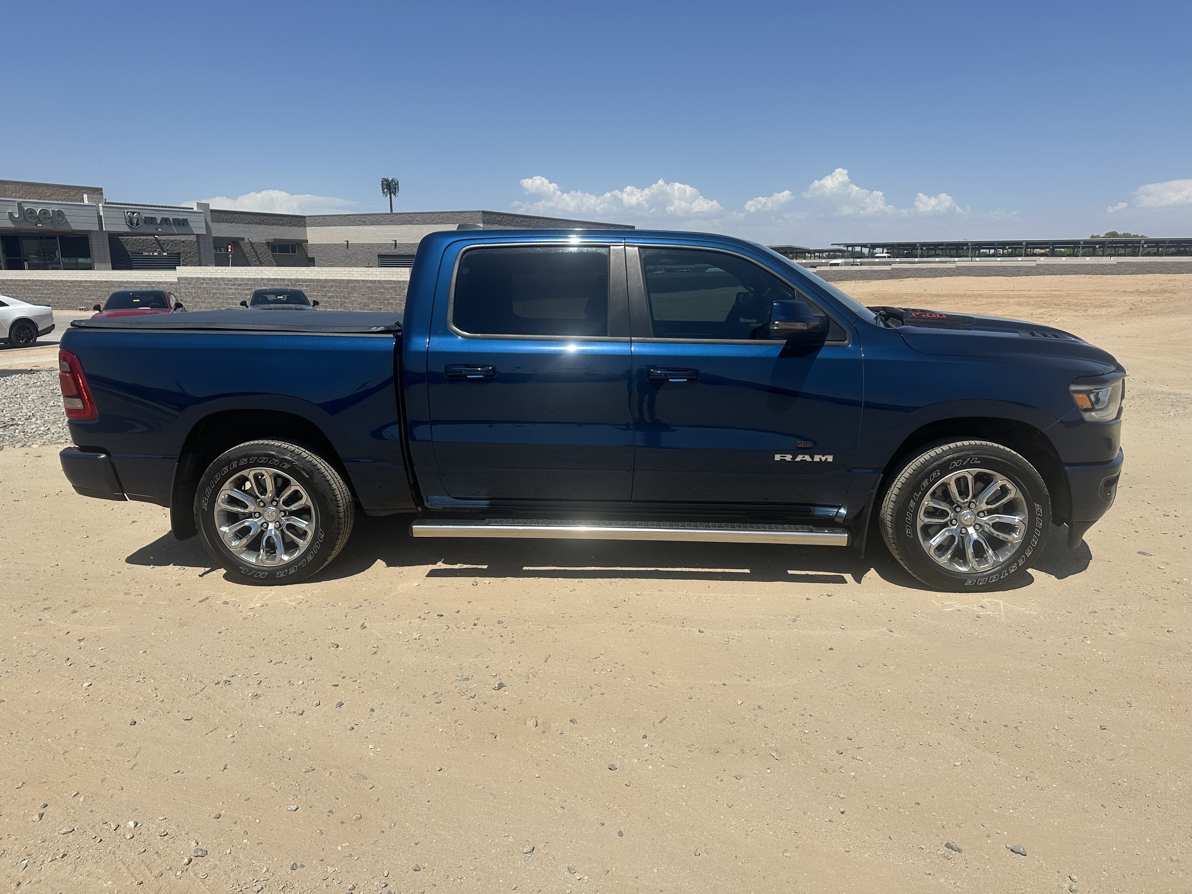 Used 2024 Patriot Blue Pearlcoat Ram Laramie image 6