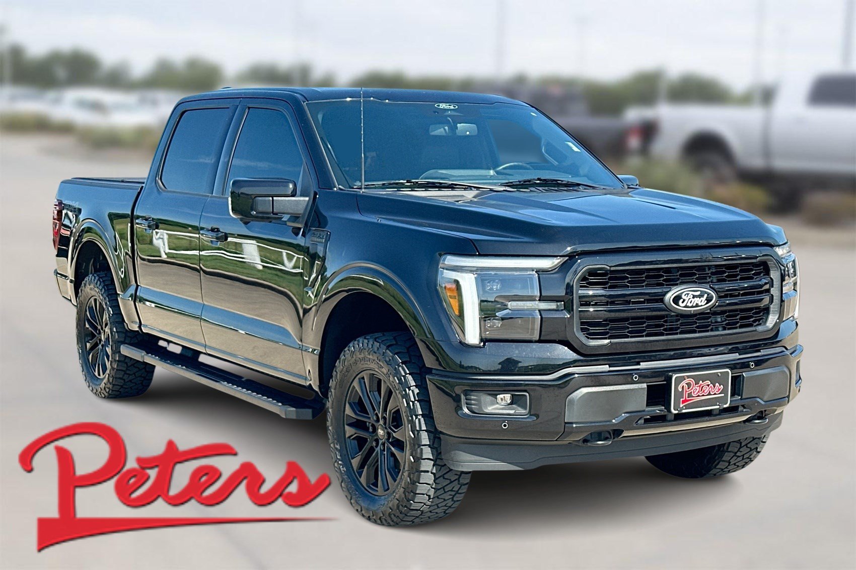 Used 2025 Black Metallic Ford LARIAT image 1