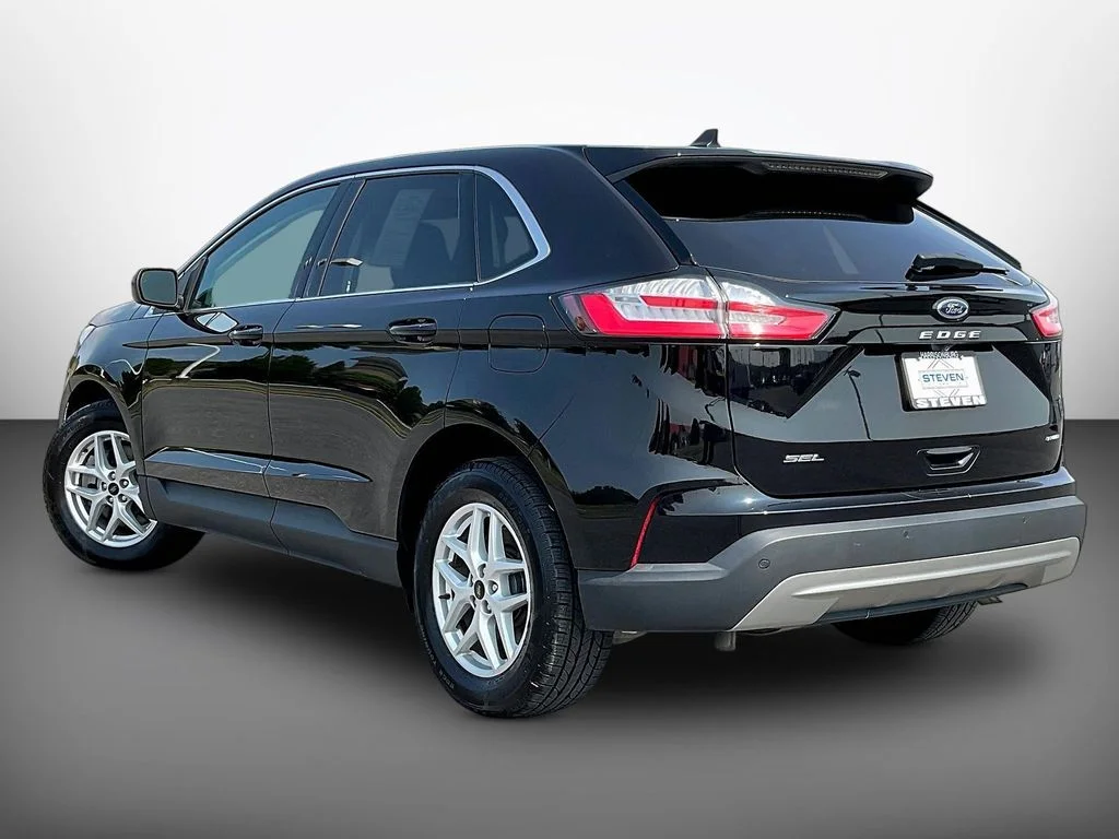 Certified Used 2023 Agate Black Metallic Ford SEL image 4