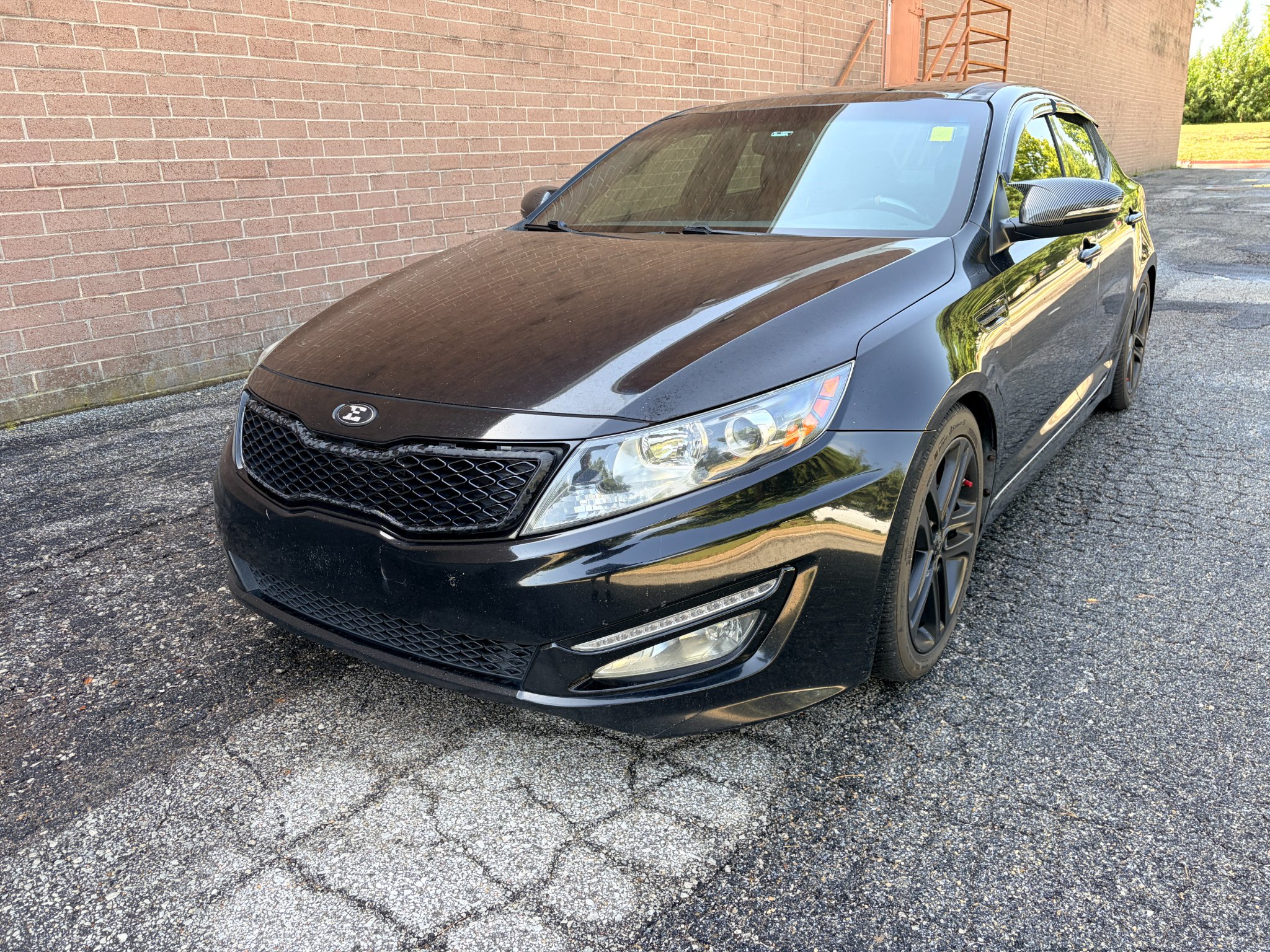 Used 2013 Ebony Black Kia SX w/Limited Pkg image 1