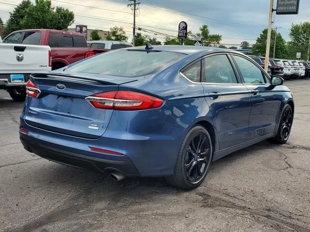 Used 2019 Blue Metallic Ford SE image 3