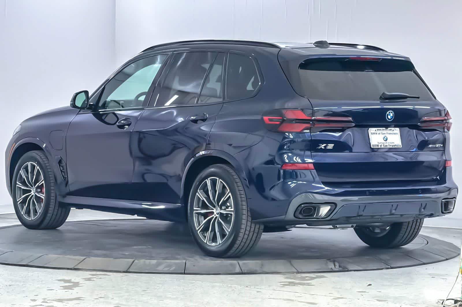 New 2026 Tanzanite Blue II Metallic BMW xDrive50e image 6