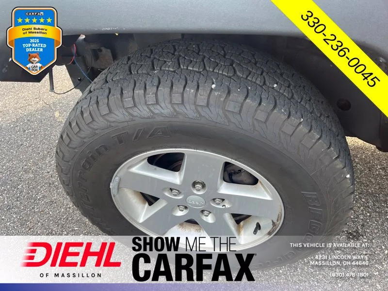Used 2013 Orange Jeep Unlimited Sport image 10