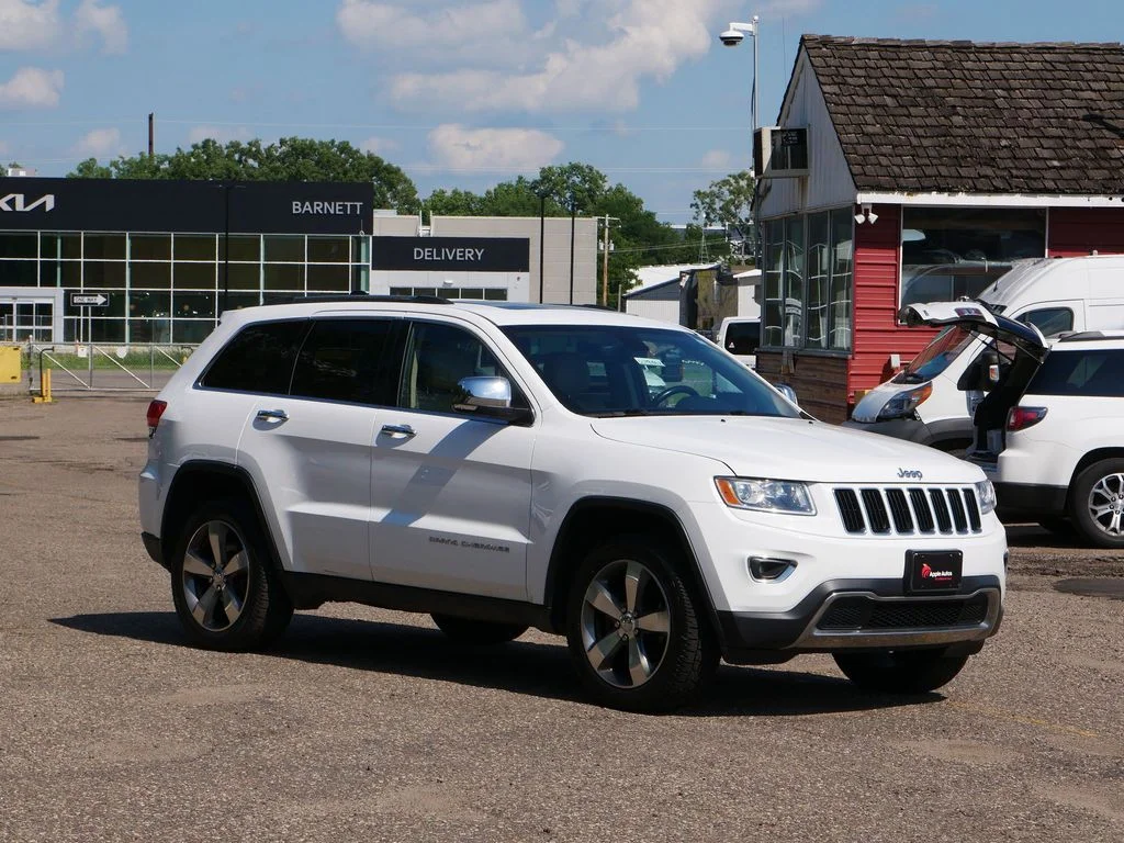 Used 2015 White Jeep Limited image 1