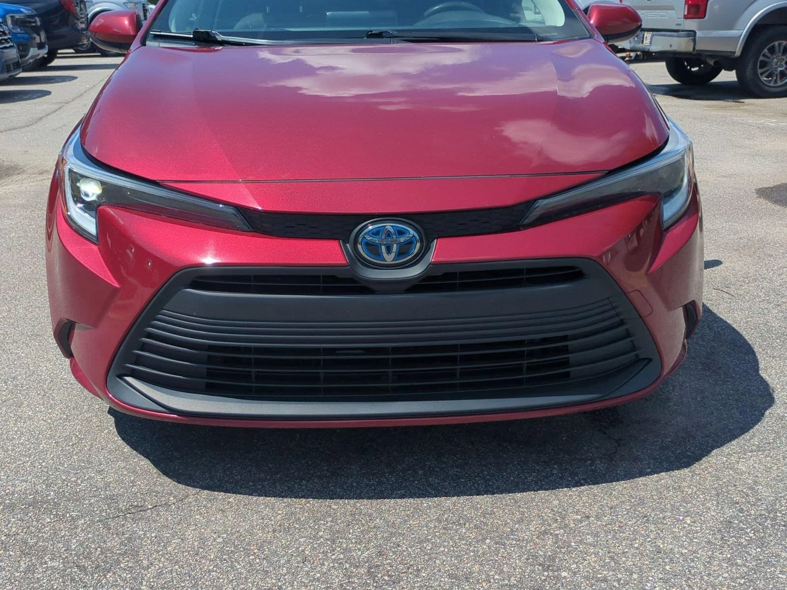 Used 2024 Ruby Flare Pearl Toyota Hybrid LE image 14