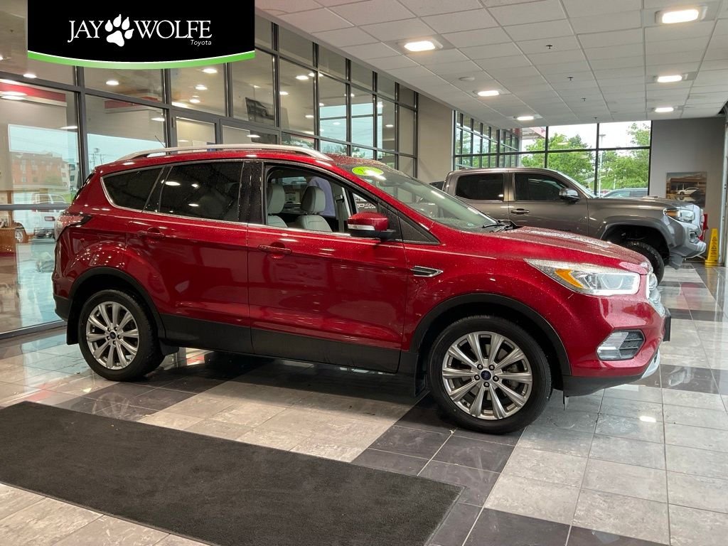 Used 2017 Red Ford Titanium image 1