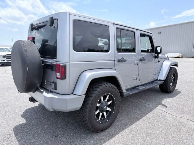 Used 2016 Silver Jeep Unlimited Sahara image 3