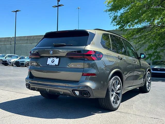 New 2026 Manhattan Green Metallic BMW xDrive50e image 3
