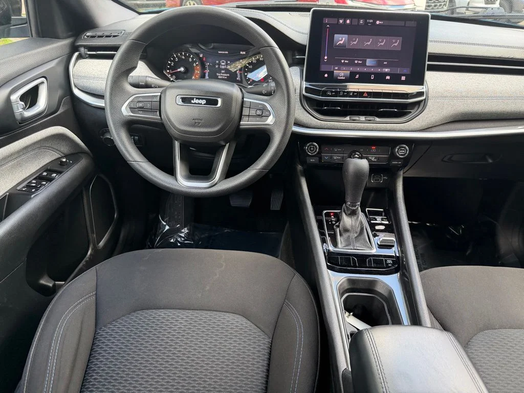 Used 2023 Laser Blue Jeep Sport image 14