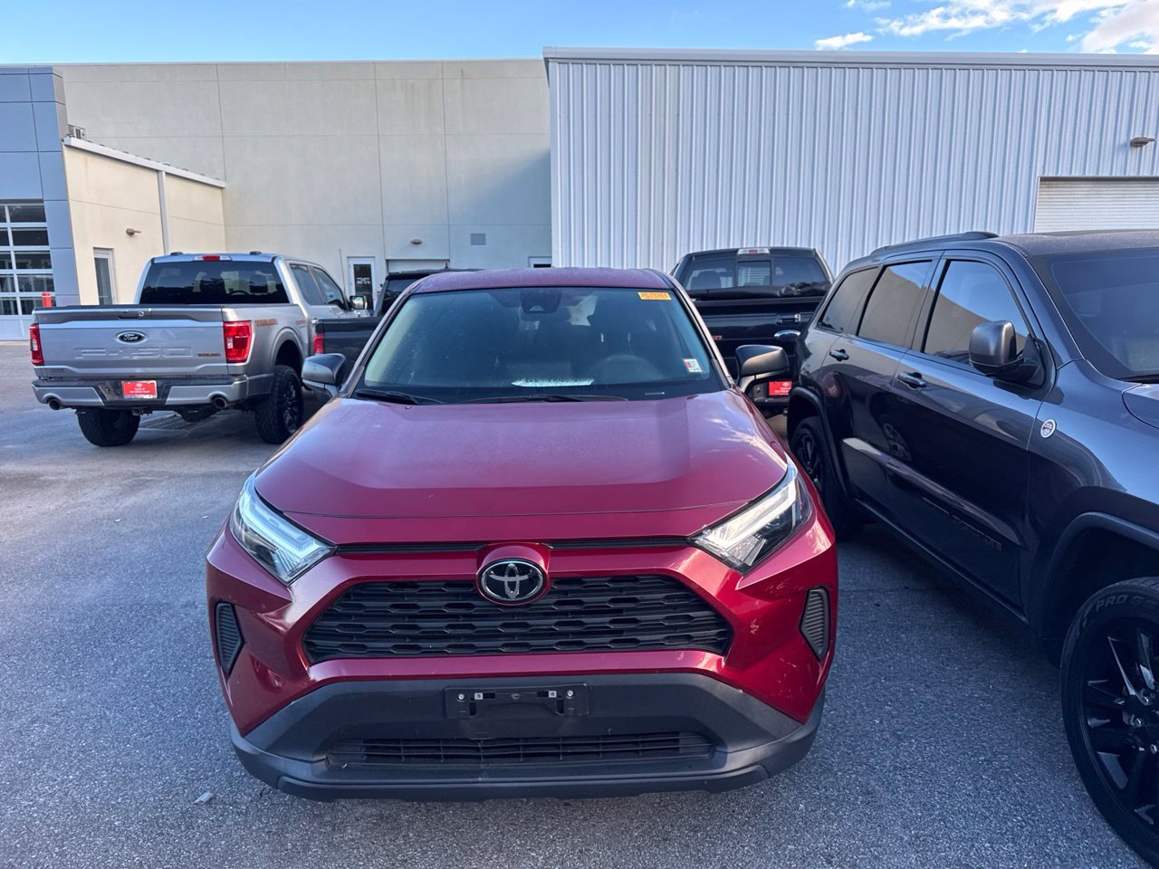Used 2023 Red Toyota LE image 2