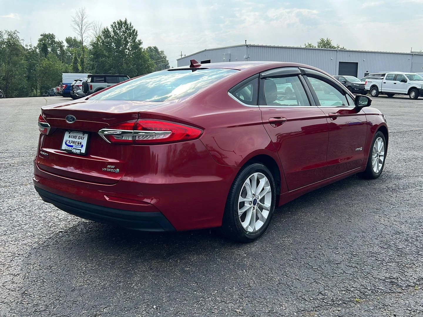 Used 2019 Ruby Red Metallic Tinted Clearcoat Ford SE image 24
