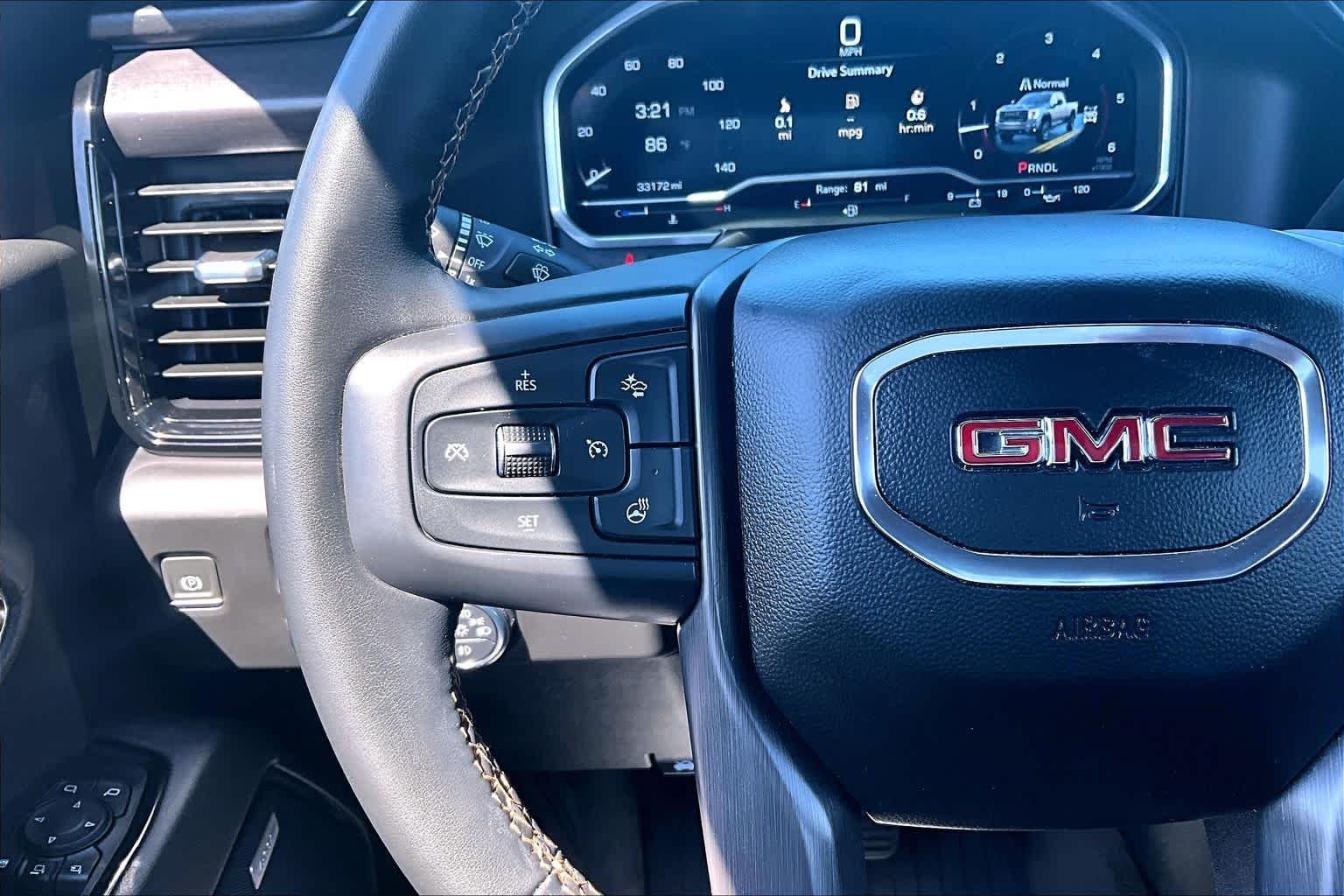 Used 2024 Titanium Rush Metallic GMC AT4 image 24