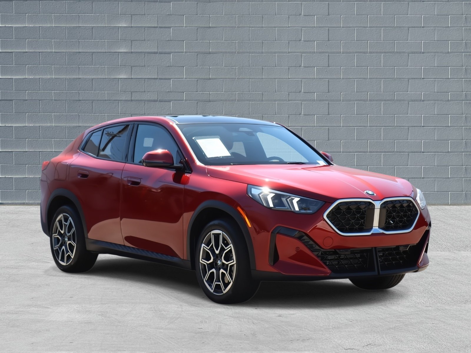 2024 BMW X2 xDrive28i Vegas Red Metallic - Sample Exterior