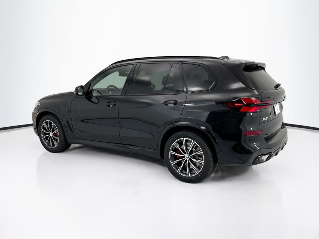 New 2026 Black Sapphire Metallic BMW xDrive50e image 7