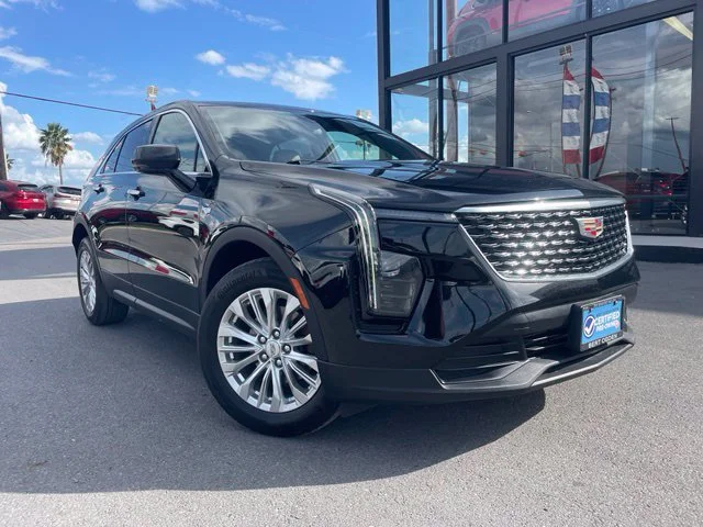 Used 2024 Black Cadillac Luxury image 1