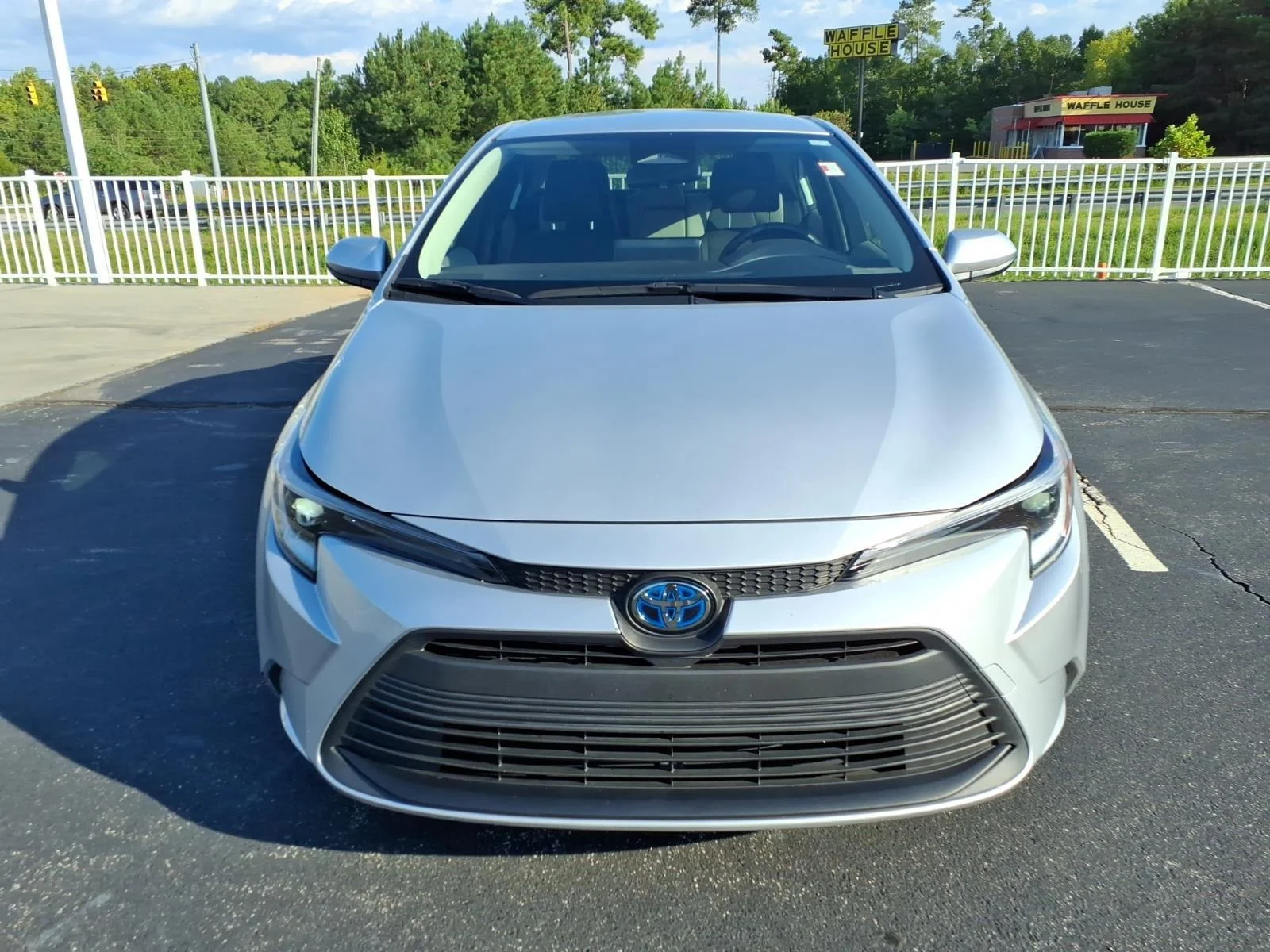 Used 2025 Classic Silver Metallic Toyota Hybrid LE image 7
